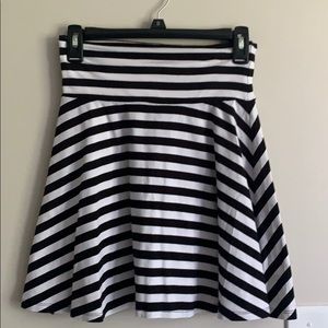 Black and white striped skirt.